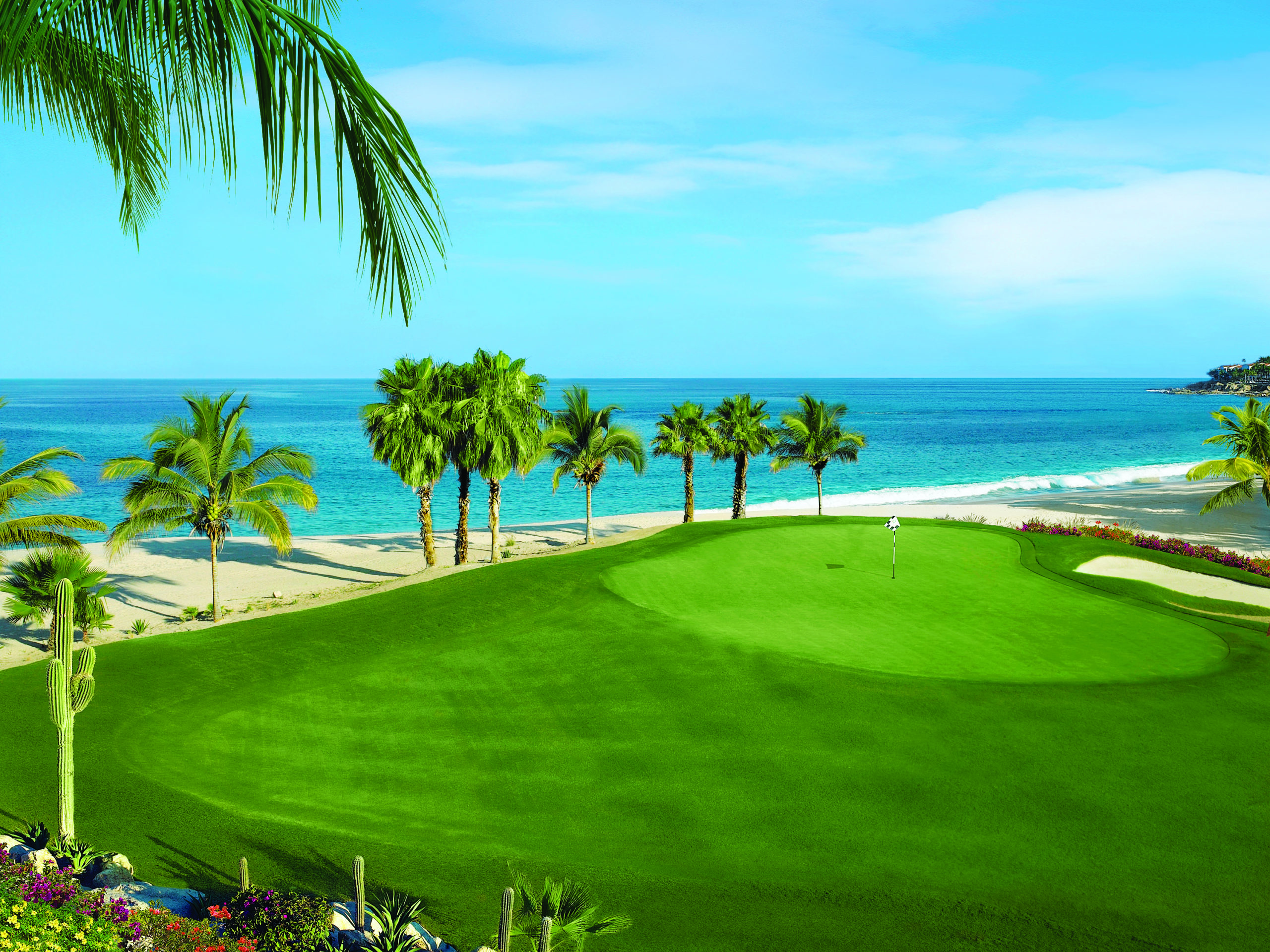 Palmilla Golf Resort Green near beach with ocean in background