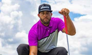 Tarek DeLavallade lining up a putt