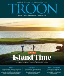 Troon Magazine Cover Volume 14, Issue 4: July/August 2023 - Island Time: Couple teeing off to an island green.
